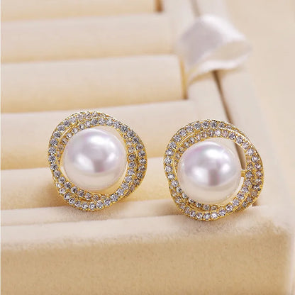 Rose pearl stud earrings with silver needle, rhinestone inlay, copper geometric circle design, white or yellow gold colour.