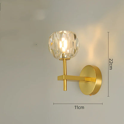 Crystal bedside lamp with stainless steel base and transparent shade providing soft illumination