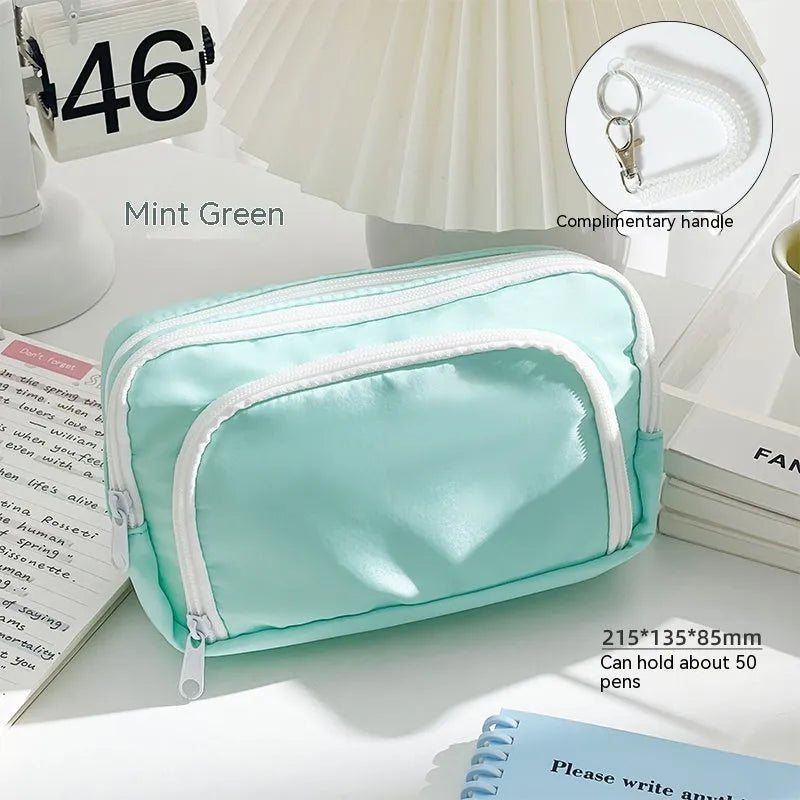 Double layer pencil case in solid colour with gift handle, dimensions 215mm by 135mm