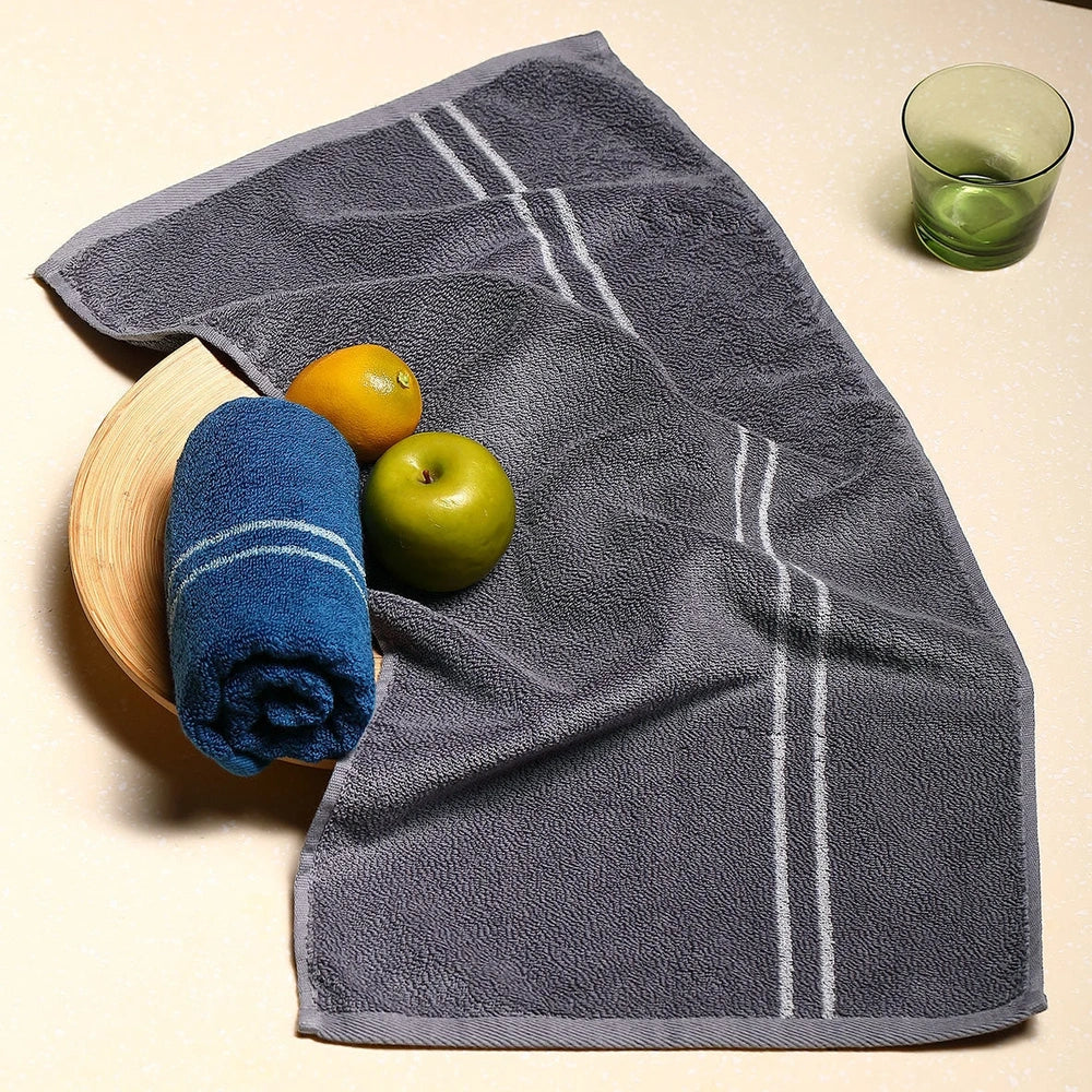 Blue smart sensor cotton towel measuring 34cm by 74cm with 100% cotton composition