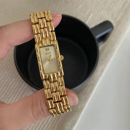 Bracelet-style women's watch with 15mm dial, 7mm thickness, mineral glass, and butterfly buckle in silver or gold.