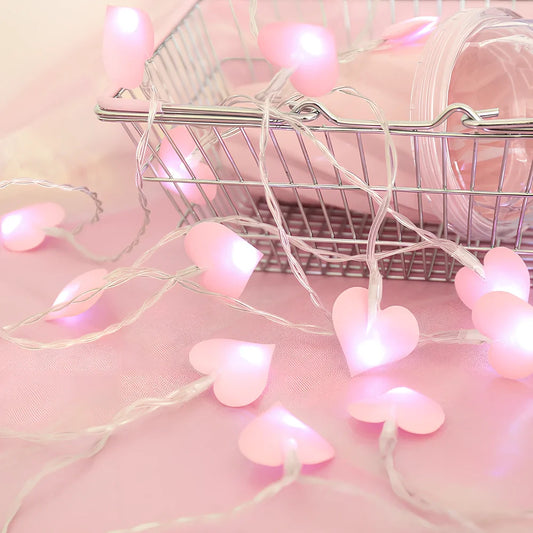 LED string lights with fabric heart elements in pink or blue colour options