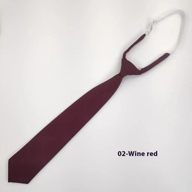 Men's navy blue cotton bow tie with arrow style shape on a white background.