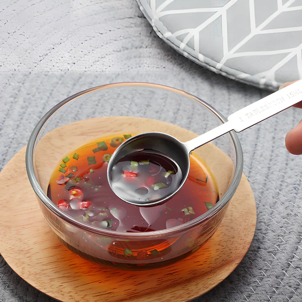 Stainless steel measuring spoon and cup set with eight pieces in silver finish