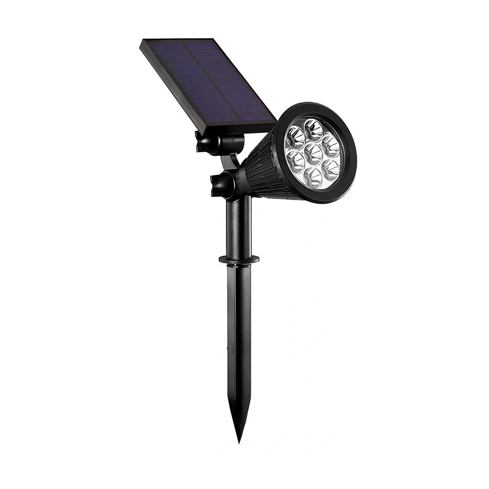 Solar lawn light with ground stake mounting, LED illumination, and waterproof housing for garden installation
