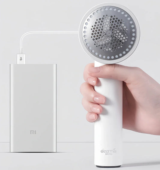 White rechargeable lint remover with detachable head and USB charging cable