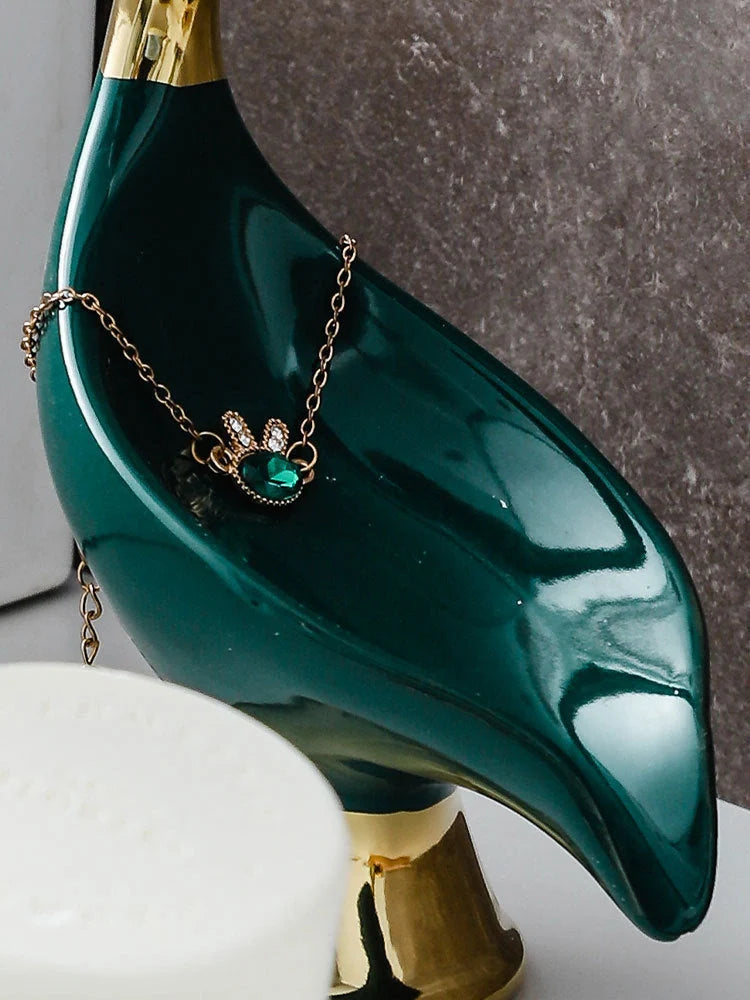 Ceramic swan soap rack in white and green with drainage cover