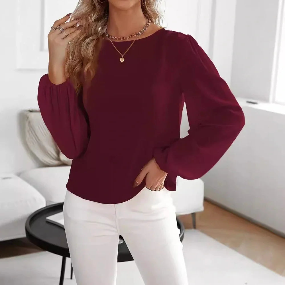 Wine red polyester long sleeve pullover top with button detailing on front, regular fit for commuting wear