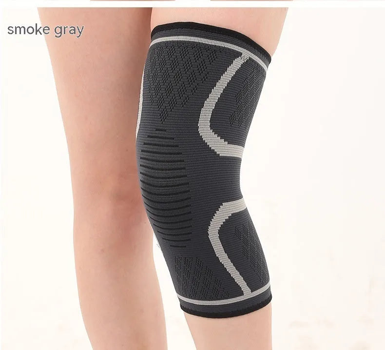 Black non-slip stretch sports knee pad shown on a knee, with size and colour options visible.