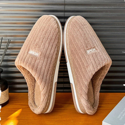 Cozy cotton slippers in various colors, featuring a soft, plush lining and non-slip rubber sole for indoor comfort and warmth