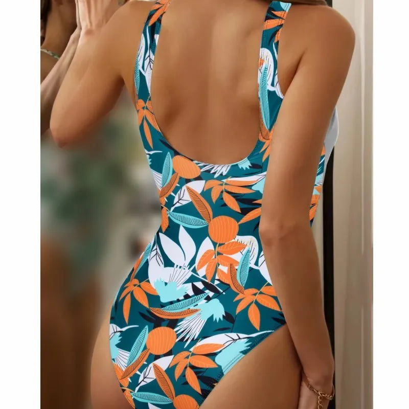 Women's one-piece swimsuit with high waist polyester and nylon fabric in printed black or white with printed pattern designs, available in sizes S, M, L, and XL for swimming and wading scenarios.