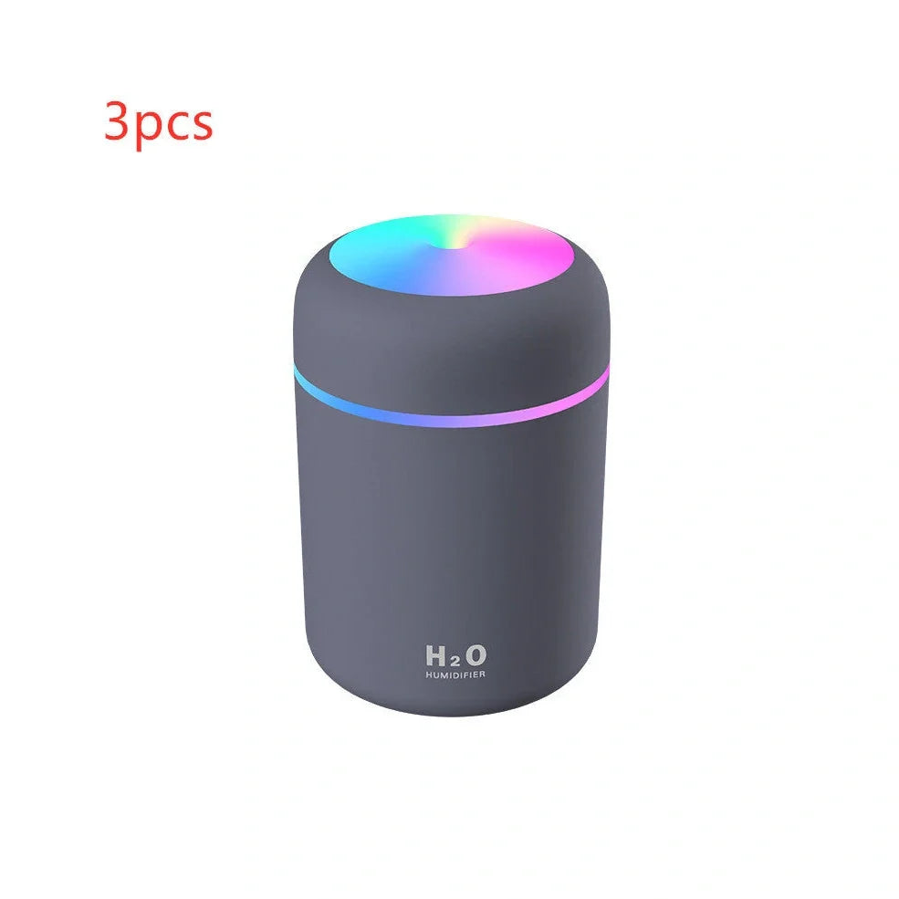Compact USB car humidifier with colourful LED light and 300ml water tank for vehicle use