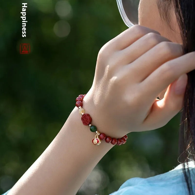 Emperor Sandstone bracelet with fu character, available in 6mm or 8mm cinnabar beads.