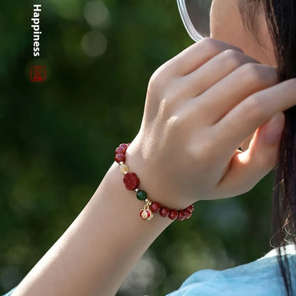 Emperor Sandstone bracelet with fu character, available in 6mm or 8mm cinnabar beads.