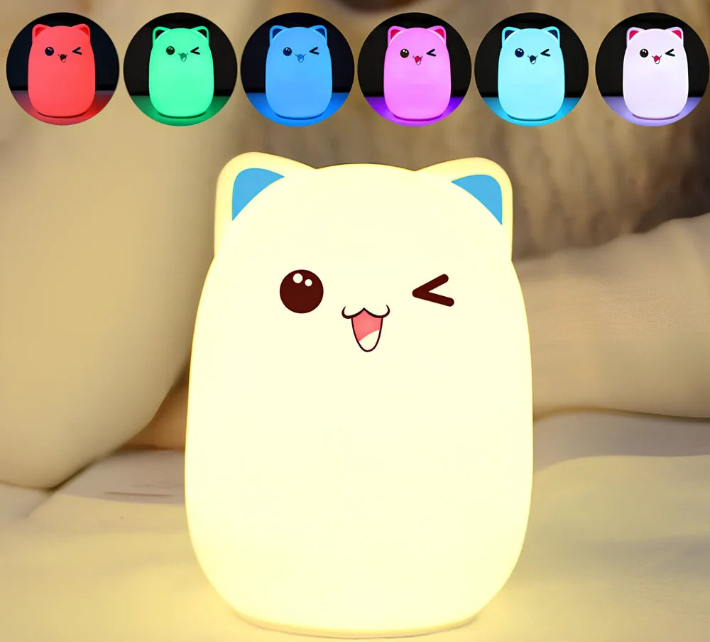 Cartoon silicone night lamp with clap activation in blue or pink, dimensions 100x100x135mm