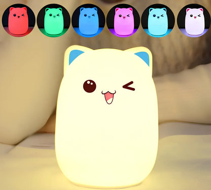 Cartoon silicone night lamp with clap activation in blue or pink, dimensions 100x100x135mm