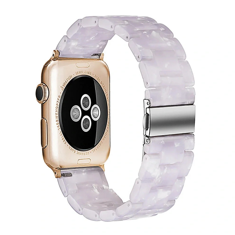 Slim resin Apple Watch strap showing attachment mechanism and colour options