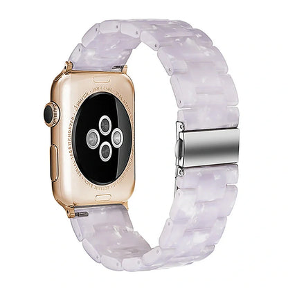 Slim resin Apple Watch strap showing attachment mechanism and colour options