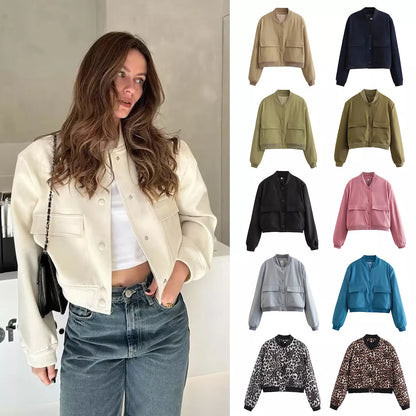 Casual cropped top with round neck and button detail in various colors