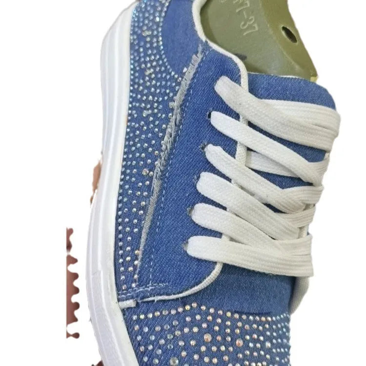 Plus size women's black lace-up casual shoes with rhinestone detail on round toe and thick rubber sole.