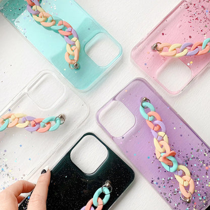 Silicone soft cover phone case with bracelet starry design in transparent, black, pink, or green for iPhone 14 and 15