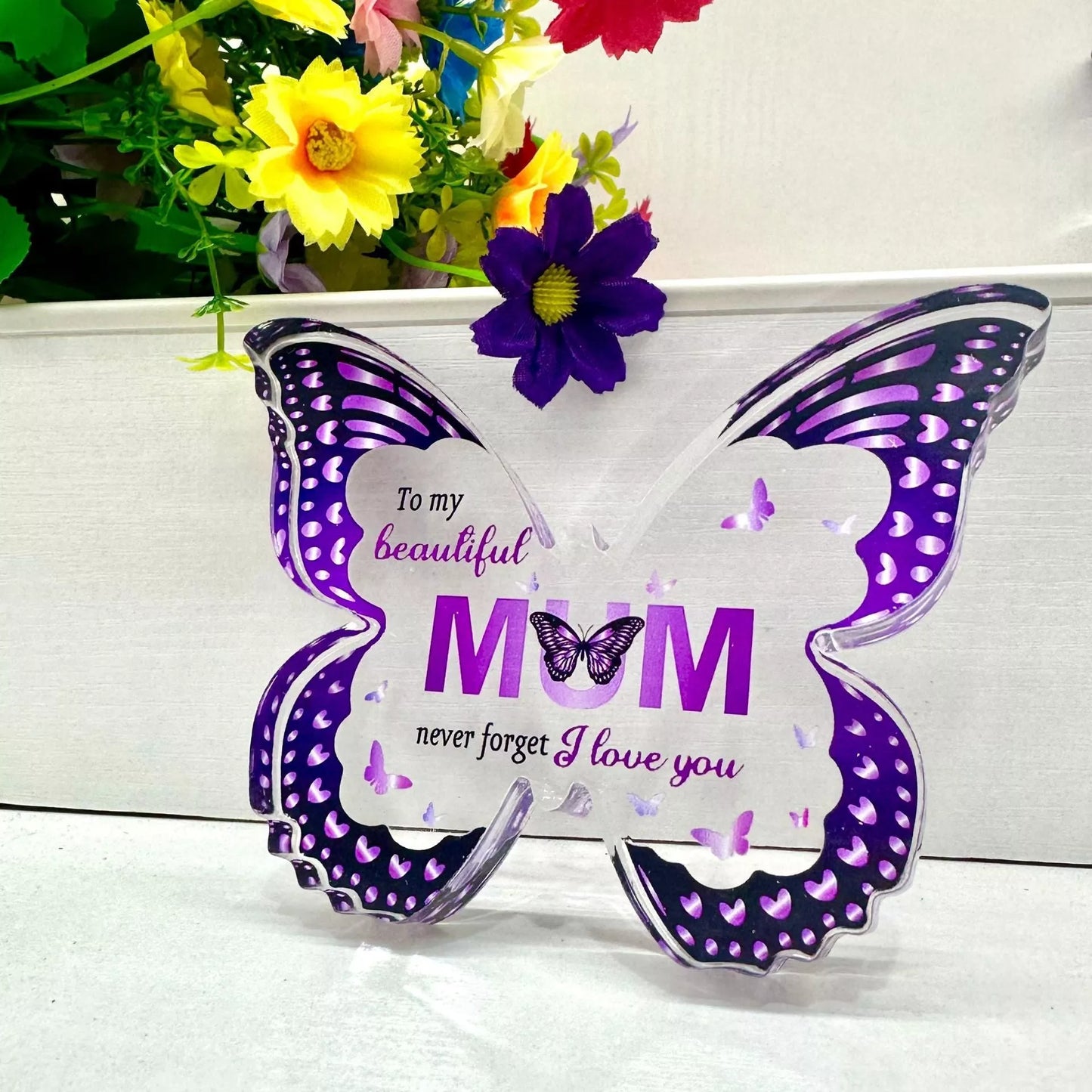 Butterfly-shaped acrylic keepsake with purple wing patterns and personalized message