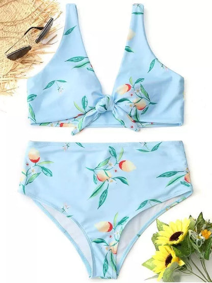 Double-sided knotted bikini swimsuit in yellow, orchid, and white floral patterns