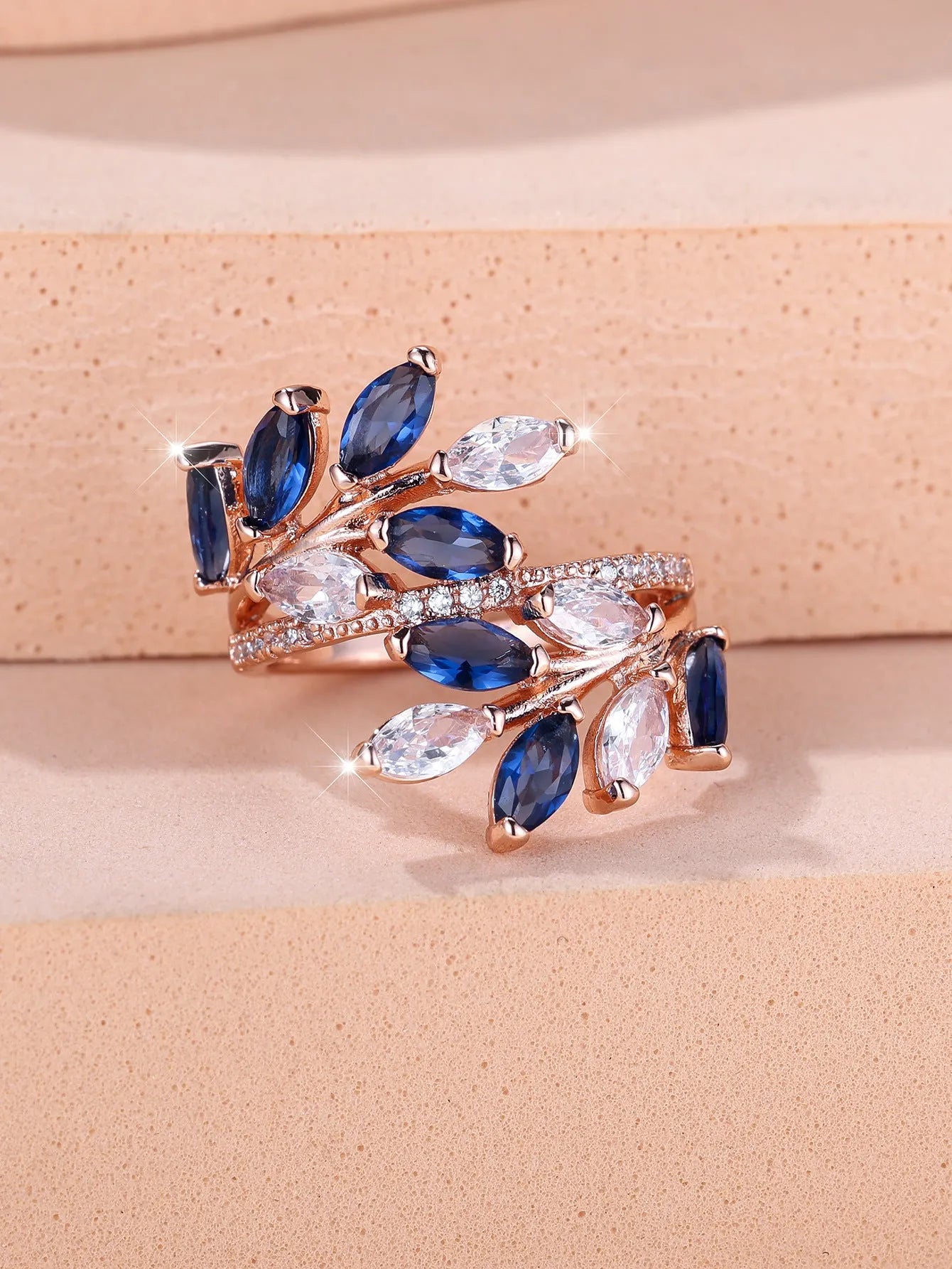 Horse Eye Zircon Leaf Ring with adjustable opening in rose gold purple white diamond colour on a hand
