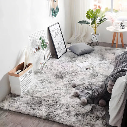 Tie-dyed variegated silk wool carpet floor mat showing organic colour patterns with polyester fibre suede backing