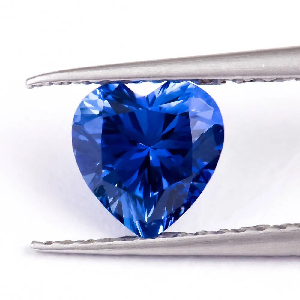 Royal blue love shaped tiara cultivate gemstone in heart and round cuts for jewellery making.