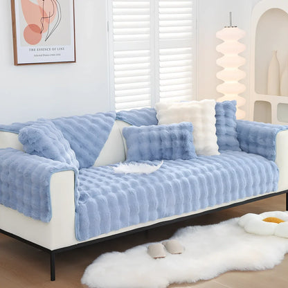 Square flannelette sofa cushion in light blue colour measuring 110x160cm on grey fabric sofa