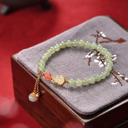 Qingshui jade women's bracelet with gold gourd charm and fu character on 6mm beads