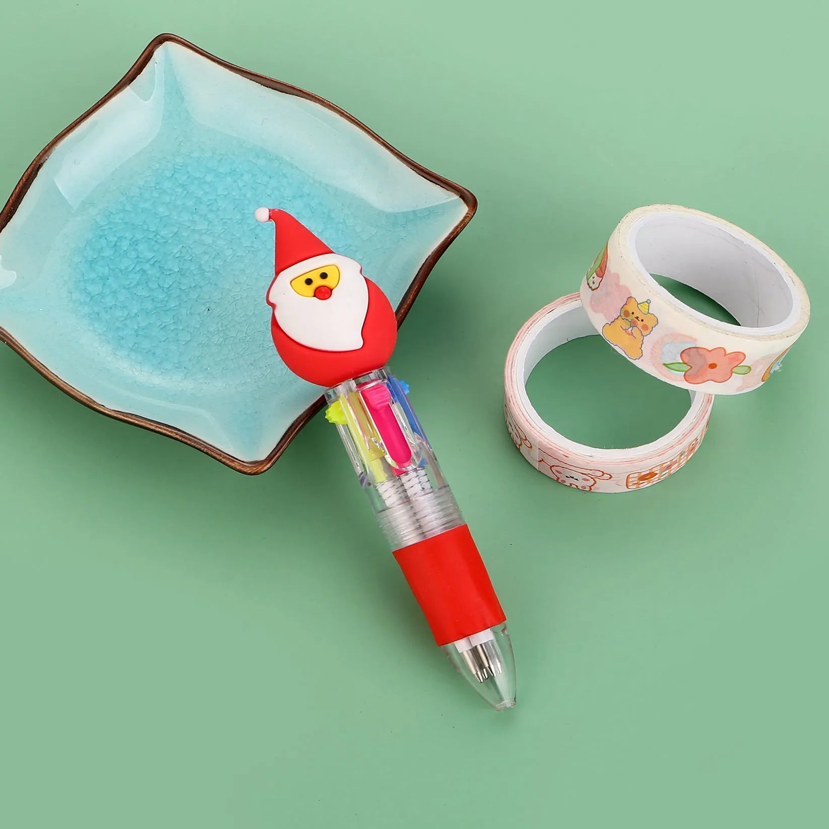 Christmas four-colour ballpoint pen with press mechanism showing festive designs