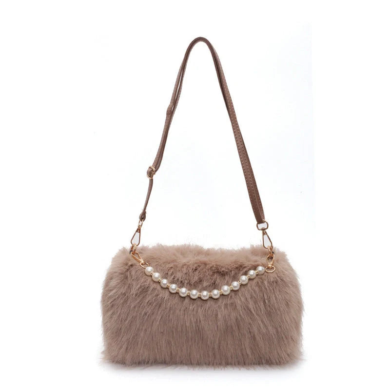 Stylish women's pearl chain crossbody bag in various colors for autumn and winter fashion
