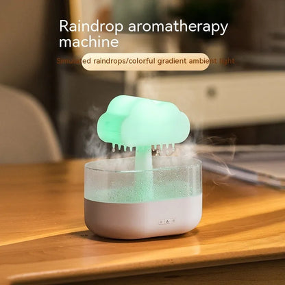 White rain cloud shaped humidifier with LED lighting and water droplet effect