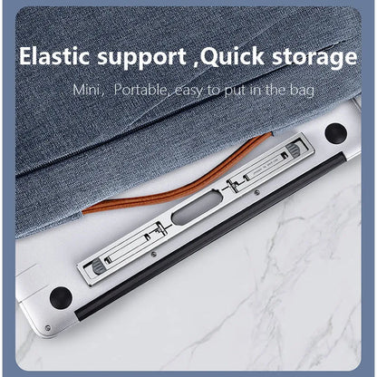 Silver aluminium laptop cooling bracket with adjustable height on wooden desk