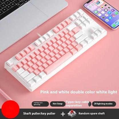 87-key mechanical keyboard with two-tone coloured keycaps on metal case