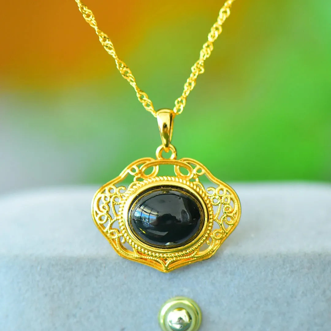Flat grey Hetian Jade pendant with ink blue jade details and copper inlay on a necklace chain