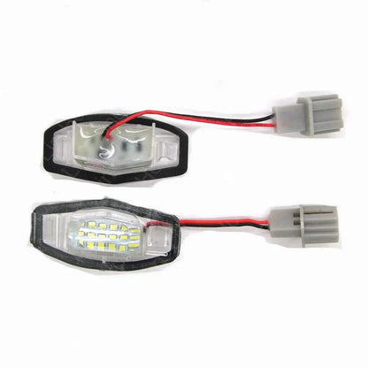 Honda Civic LED licence plate light showing white 6500-7000K illumination with plastic housing