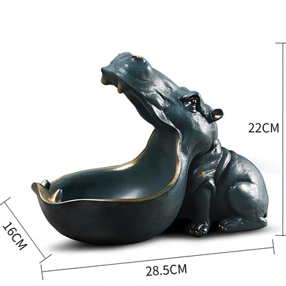 Handmade blue resin hippo storage figurine with removable top showing interior compartment