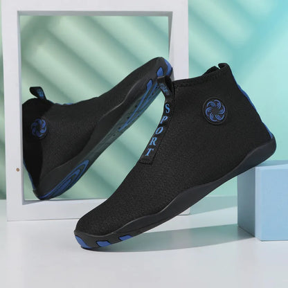 Casual mid-top beach shoes in black and fluorescent green with a mesh upper and rubber sole.