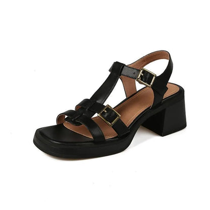 Black women's retro sandals with T-buckle, chunky heel, and open square toe.