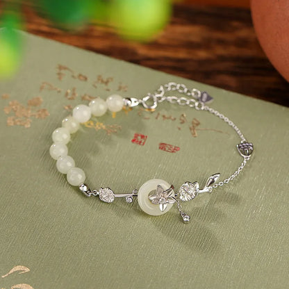 Hetian jade lotus peace buckle bracelet in 925 silver with gold plating, antique retro style