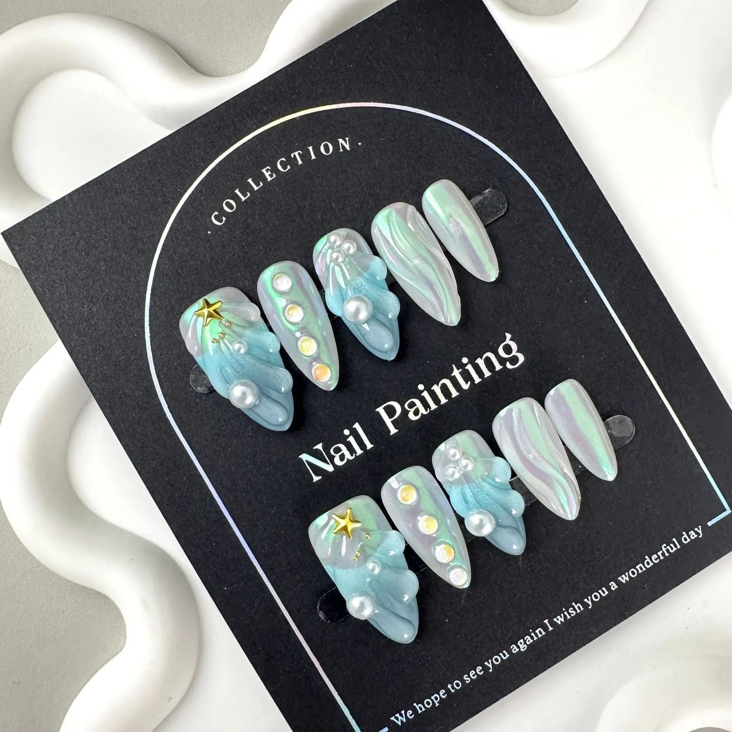 HAILANG blue shell design plastic false nail tips in sizes XS S M L