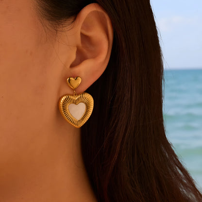 Gold-colour heart-shaped earrings with white fritillary design on stainless steel with electroplating