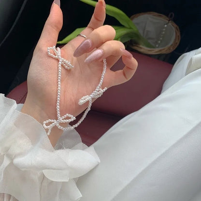 White adjustable sweet bow pearl necklace for women with geometric design and 31-40cm length