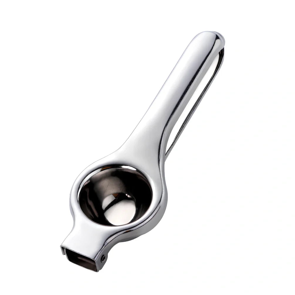 Manual stainless steel juicer with 5.5cm feed opening in gold finish on kitchen counter