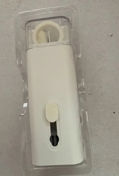 Multifunctional white cleaning pen kit open to show silicone tip, brush, keycap puller, and spray bottle for electronics.