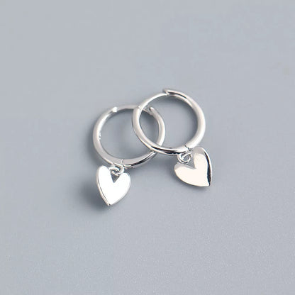 Love Heart Earrings in gold or silver finish, perfect for women's fashion accessories