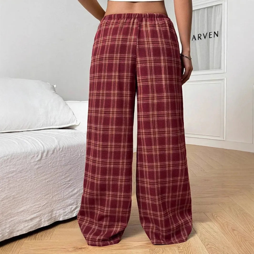 Women's loose plaid trousers with drawstring waist and pockets in red or blue colour options